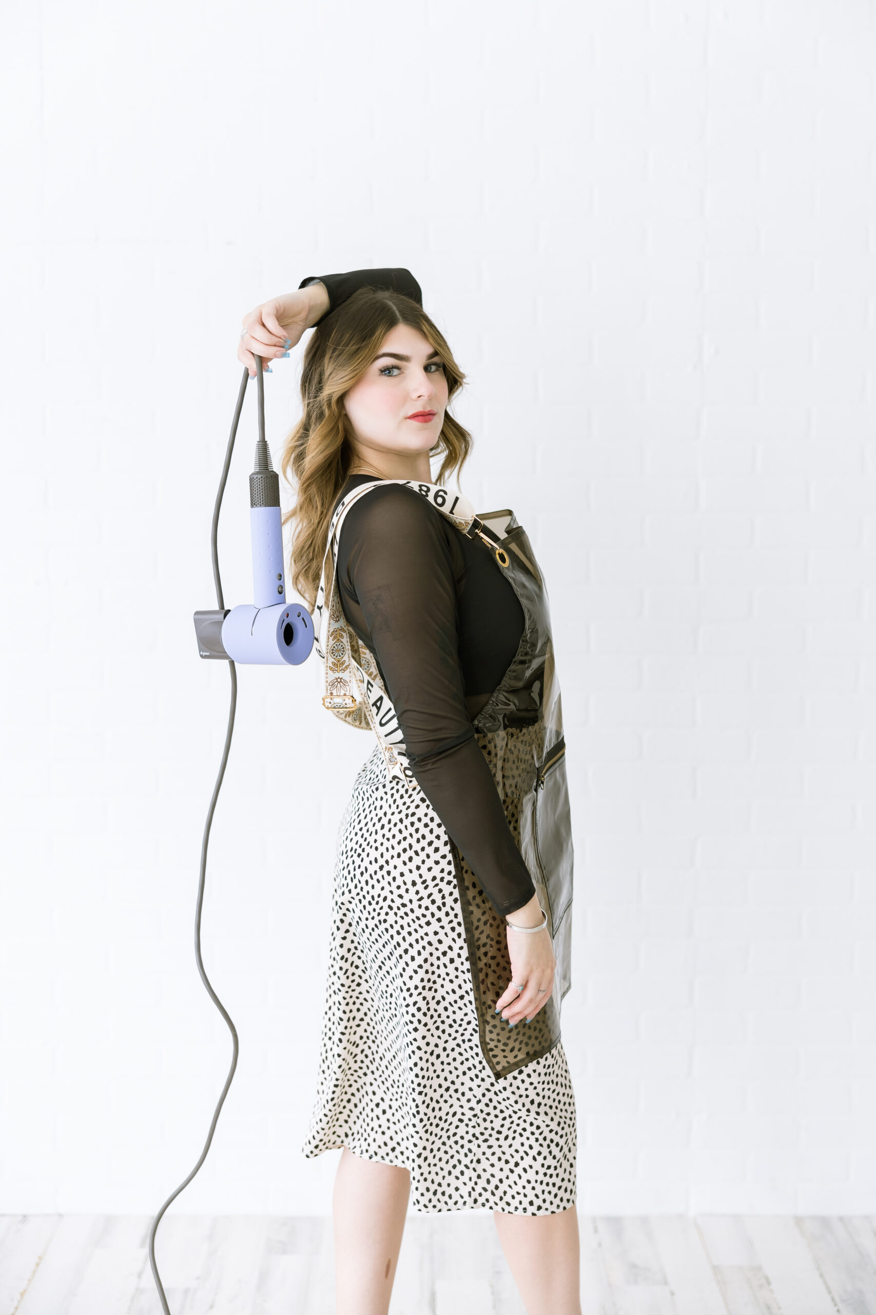 Madison of Madd Luv Salon posing during studio branding photoshoot