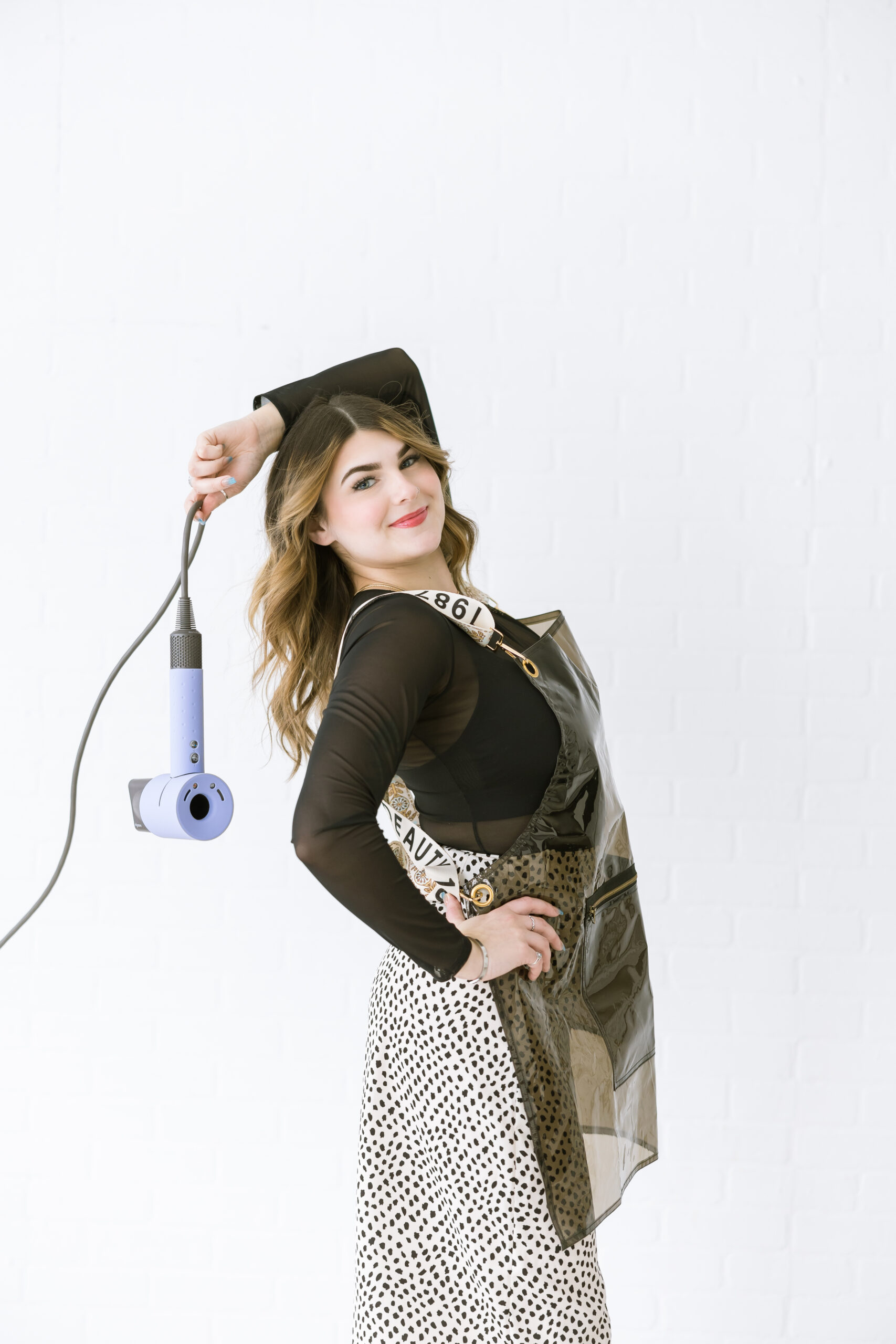 Madison of Madd Luv Salon posing during studio branding photoshoot