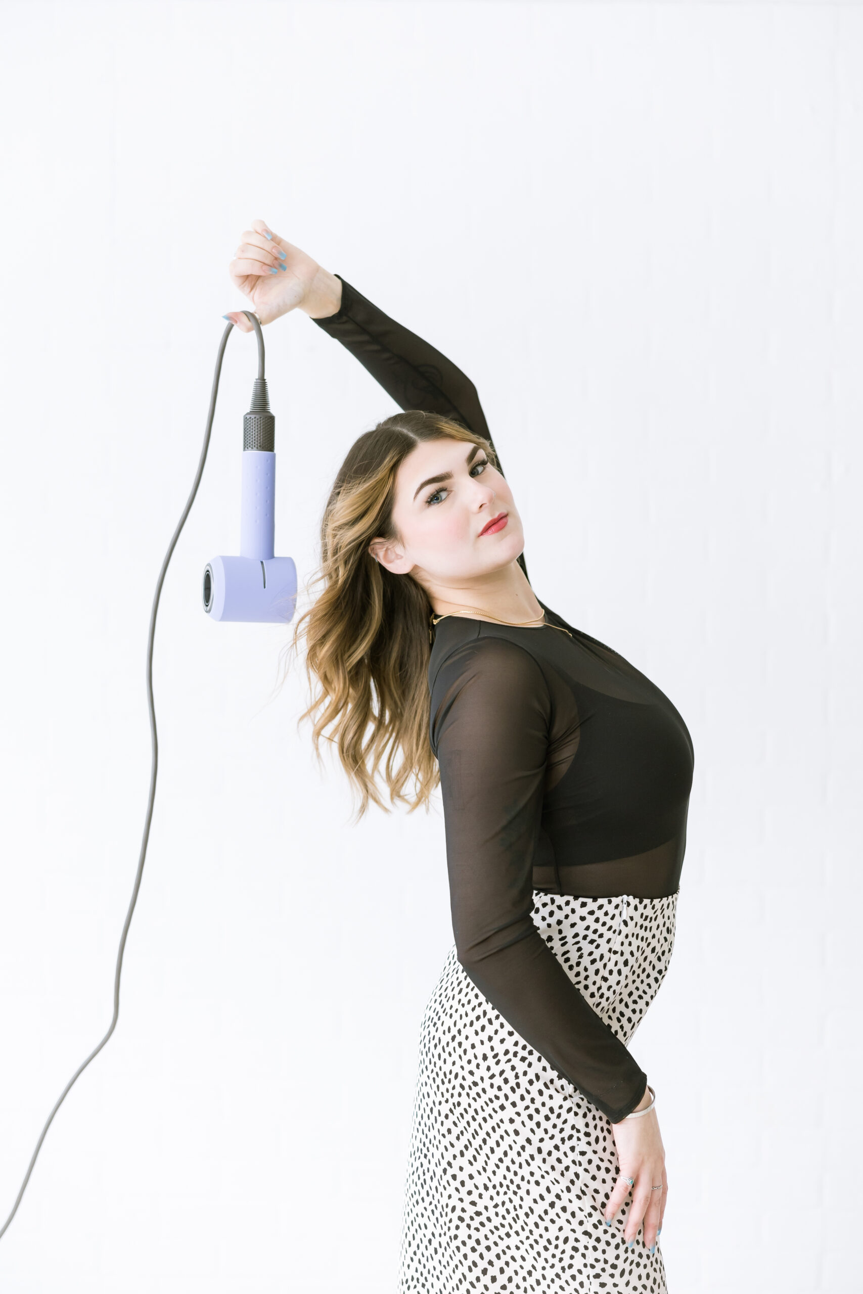 Madison of Madd Luv Salon posing during studio branding photoshoot