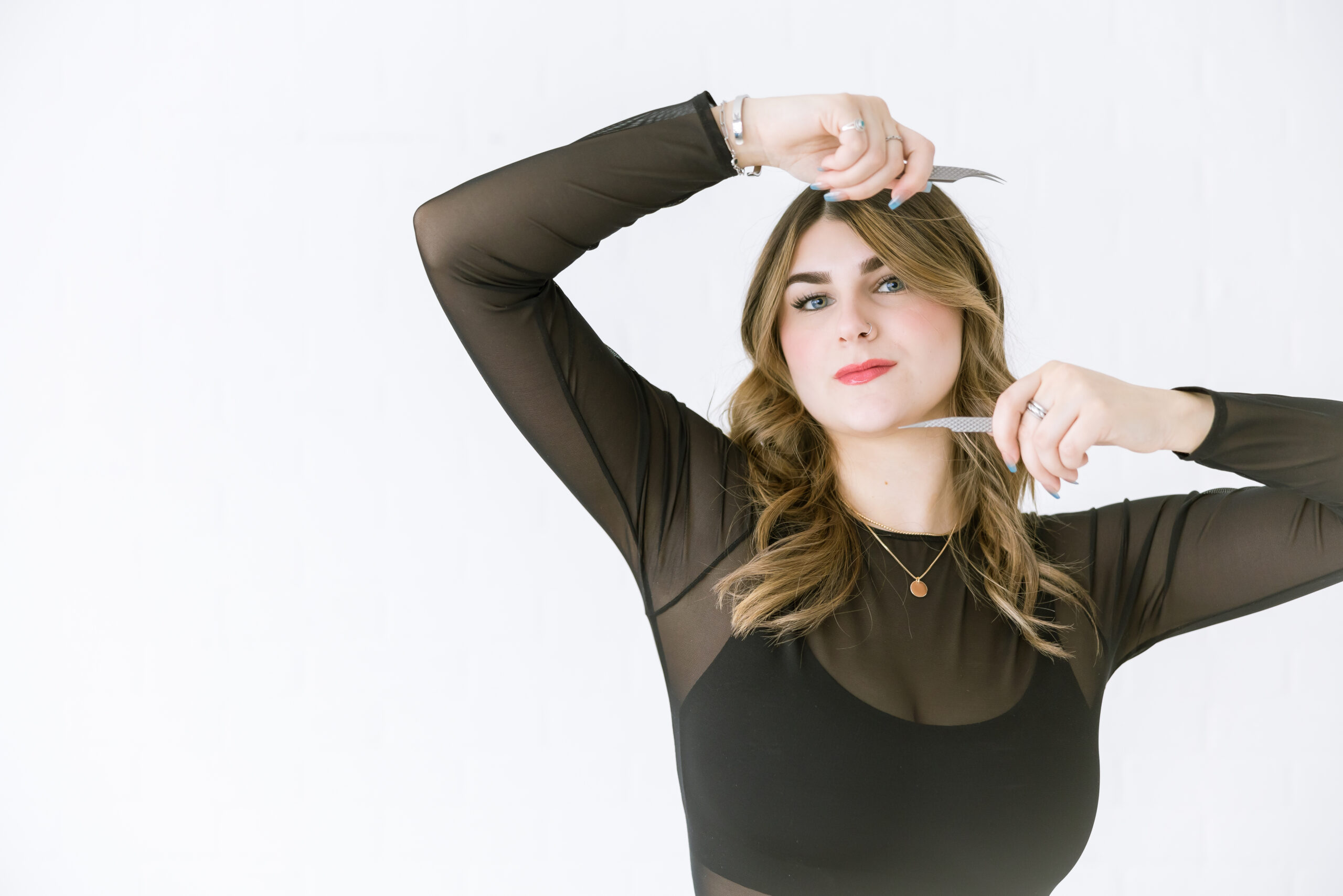 Madison of Madd Luv Salon posing during studio branding photoshoot