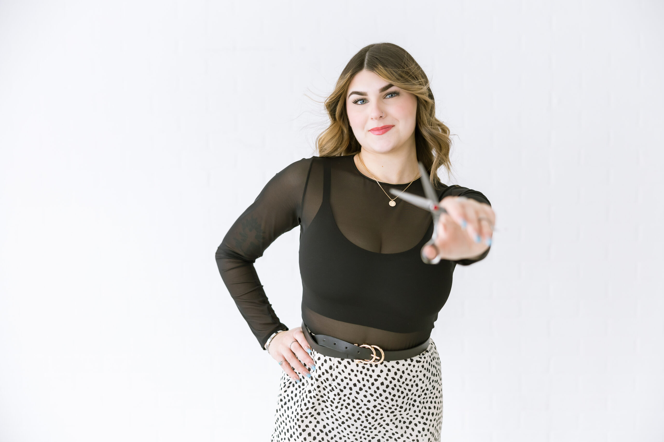 Madison of Madd Luv Salon posing during studio branding photoshoot